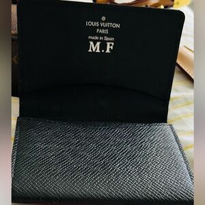 Authenticity guaranteed Louise Vuitton wallet…